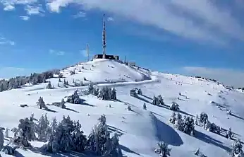 Zirveden ovaya beyaz örtü