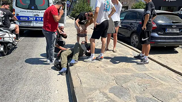 Otomobilin Çarptığı Sürücü Düşüp Yaralandı