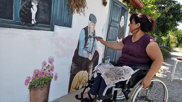 Resim tutkusuyla engelleri aşıyor